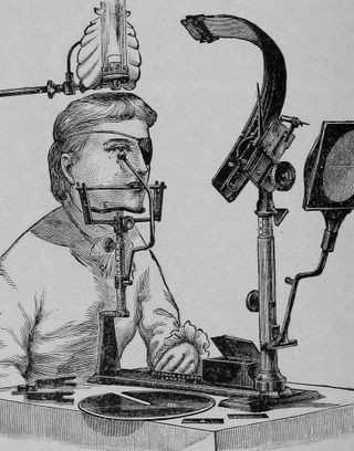 Illustration of the examination of eye and ear taken from a medical textbook published in 1904